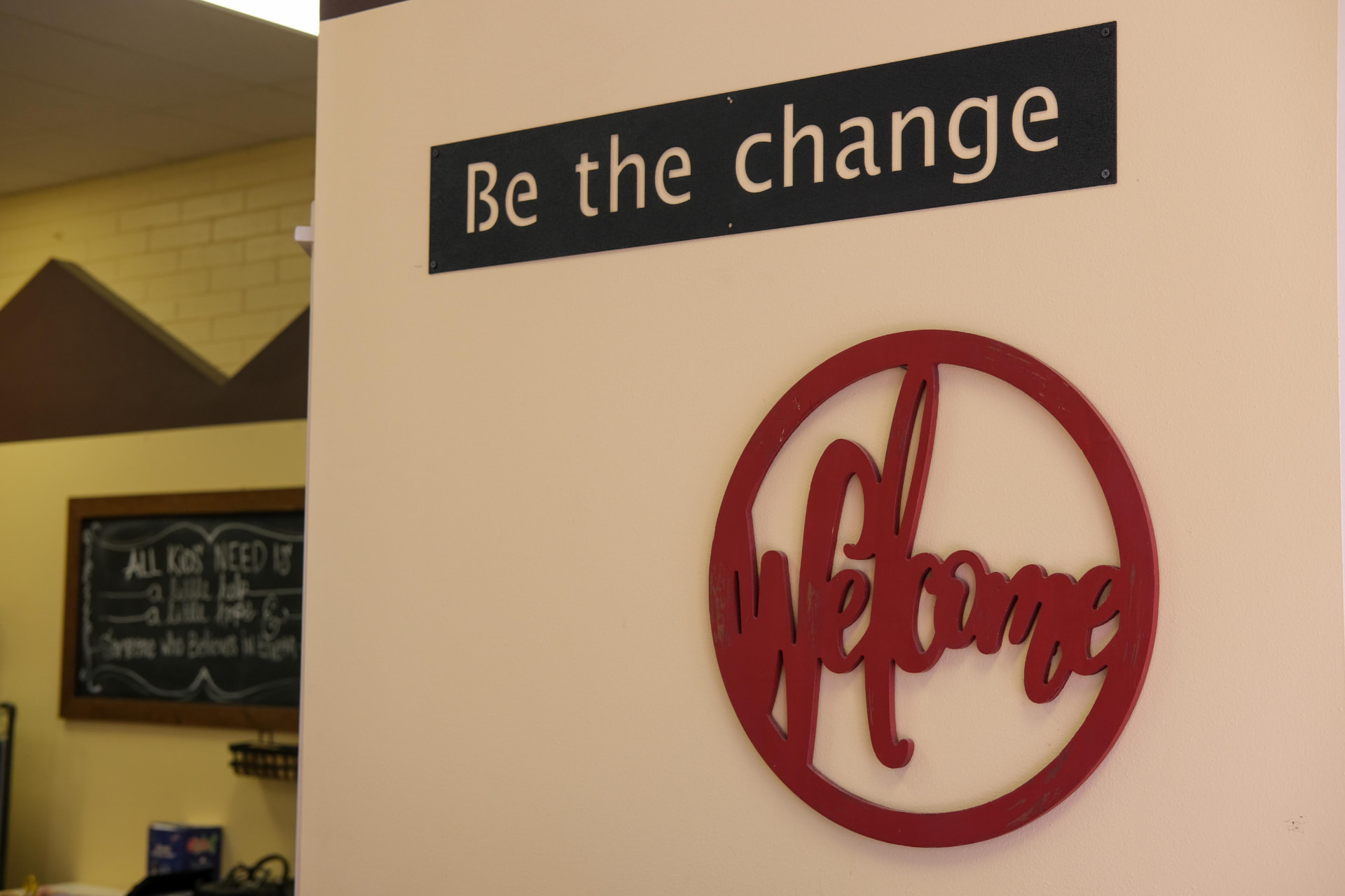 A warm welcome sign inside the school